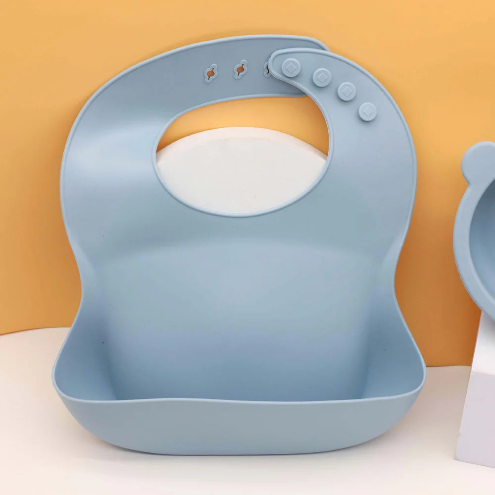 Babero de silicona de grado alimenticio con recolector de comida, ajuste tridimensional y multi-etapa, fácil de limpiar