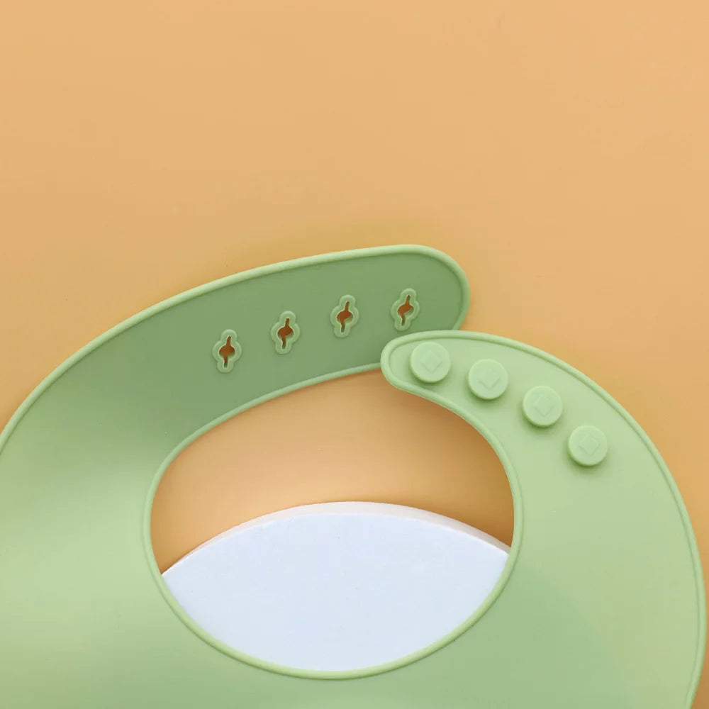 Babero de silicona de grado alimenticio con recolector de comida, ajuste tridimensional y multi-etapa, fácil de limpiar
